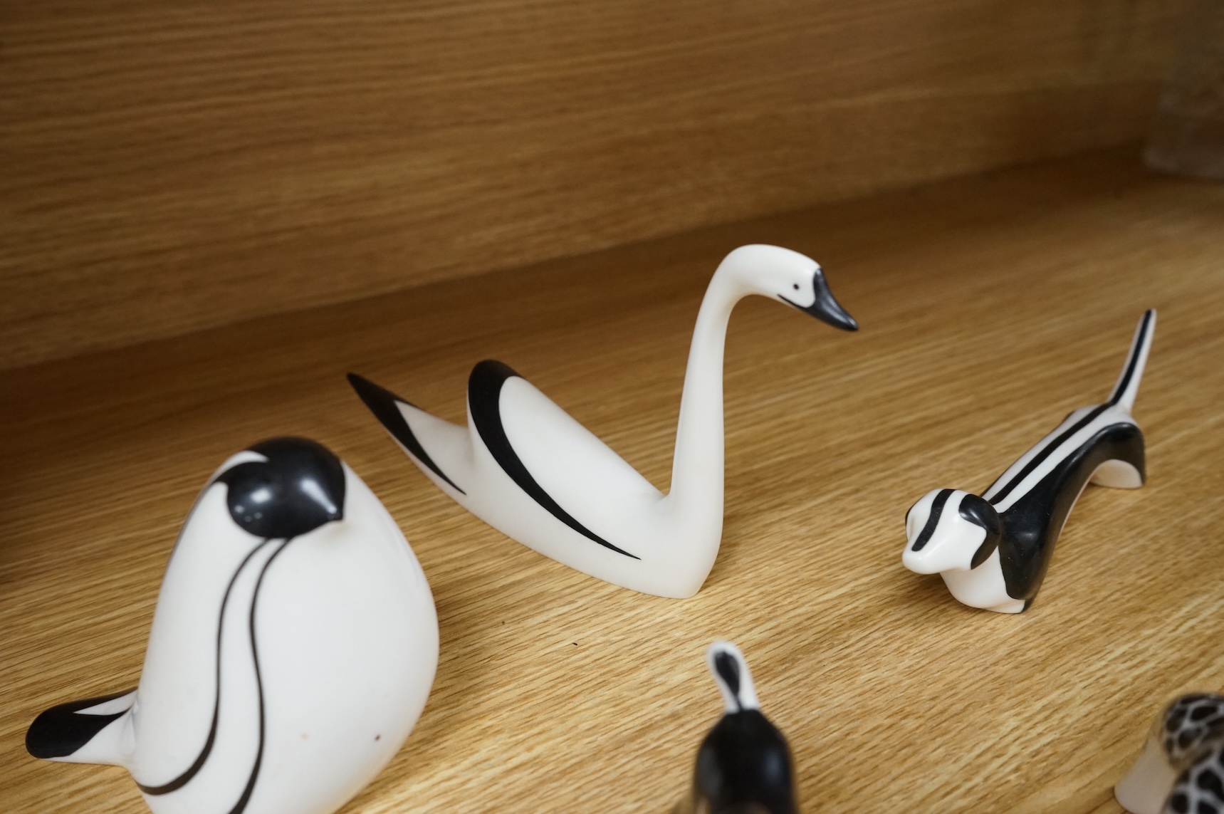 A collection of mid century Cmielow ceramic animals to include cat, rabbit and swan, largest 18cm in length